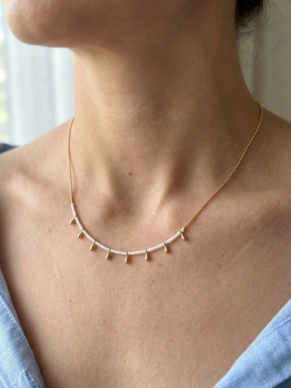 Delicate Gold Teardrop Necklace with White Accents -